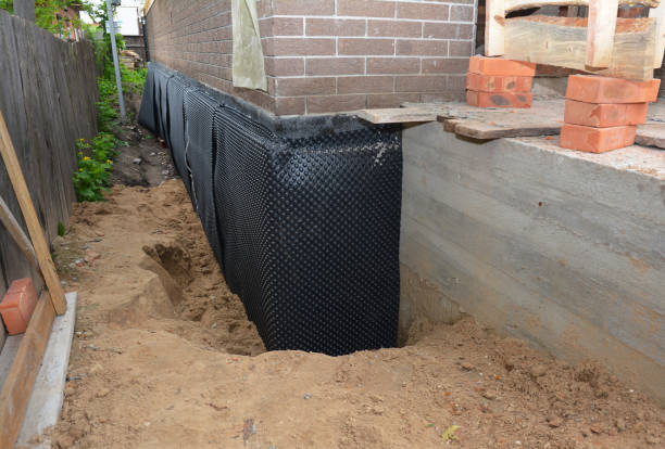SJ Waterproofing Pros technician performing targeted Vapor Barrier Installation assessment in Matthews, IN